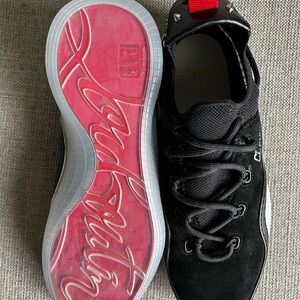 Christian Louboutin suede runners.